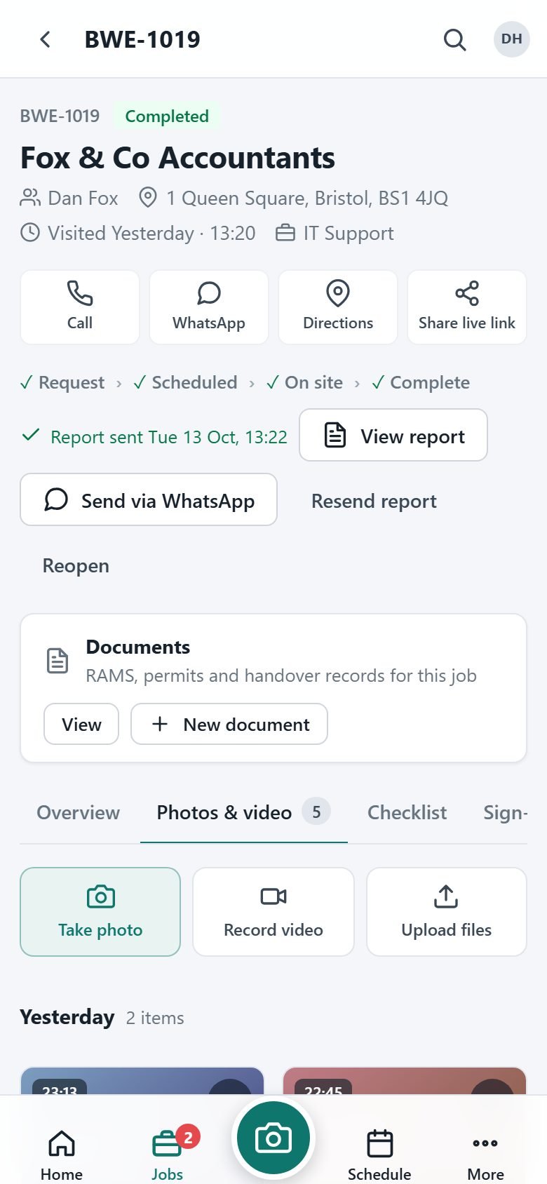 A finished job on a phone: the customer, visit progress, report sent, documents and photos